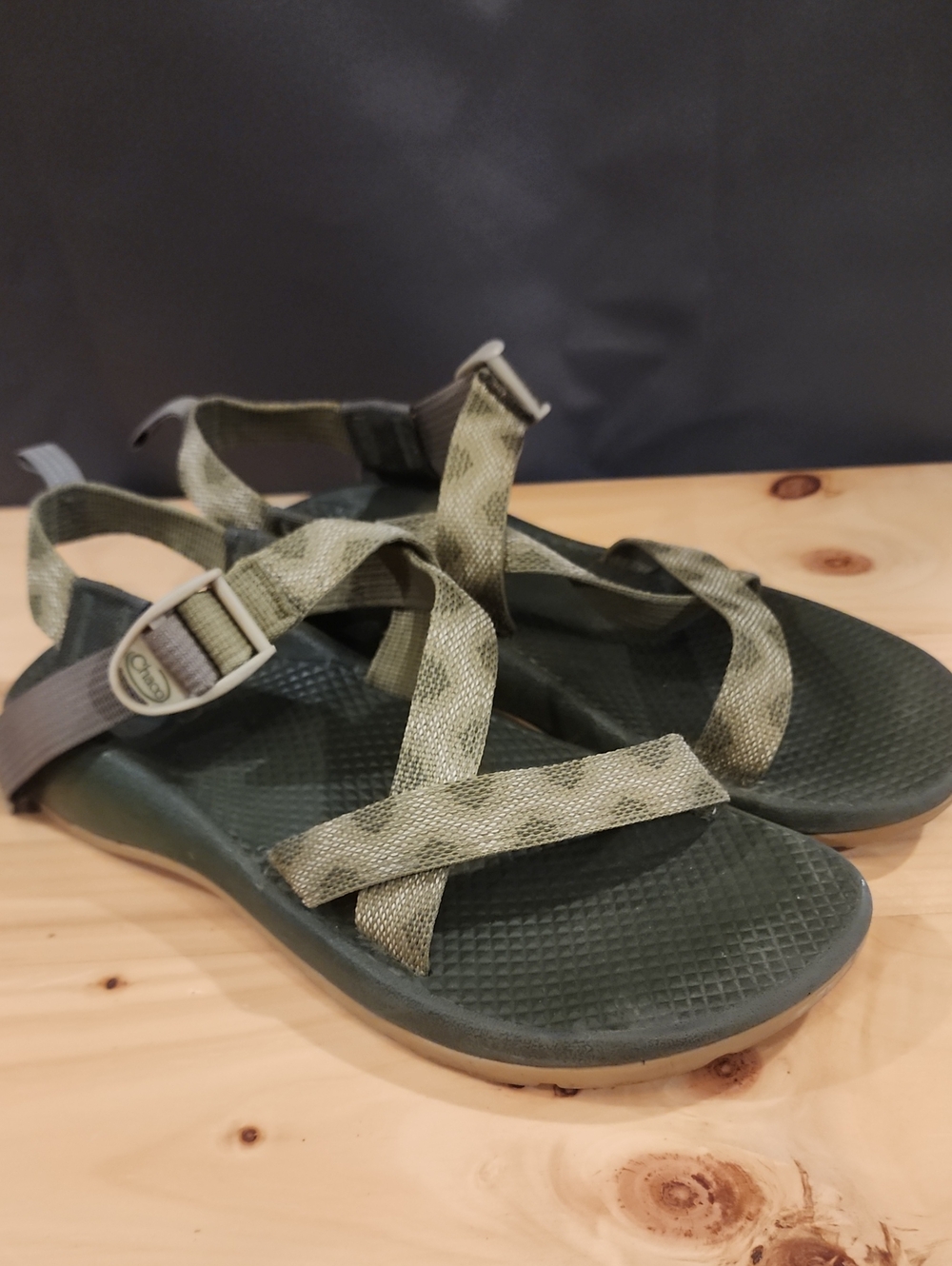 Chaco Mega Z/Cloud sandals feature a green, patterned wide-strap design